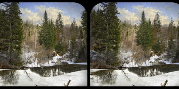 A stereoscopic photograph showing a mirrored landscape of a snowy forest. Two identical side-by-side images depict tall evergreens and bare deciduous trees along a partially frozen riverbank under a bright, cloudy sky, designed to create a 3D effect when viewed through a stereoscope.