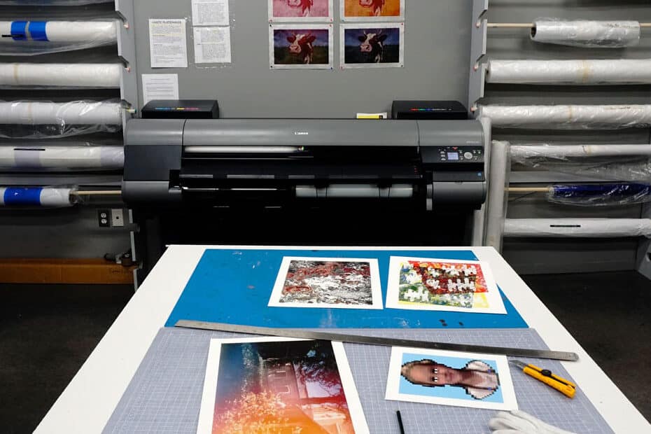 Large-format printing and scanning equipment lining the Digital Printing Studio.