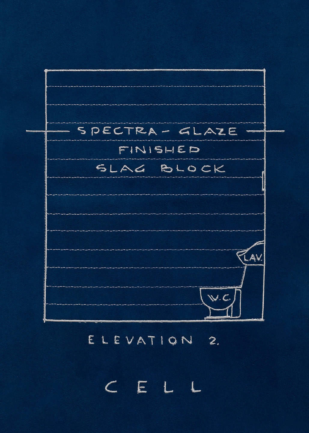 Hand-stitched fabric blueprint labeled "Elevation 2 CELL", showing a rectangular room with "Spectra-Glaze Finished Slag Block" text stitched at the top. In the bottom right, “LAV.” and “W.C.” mark a lavatory and toilet.