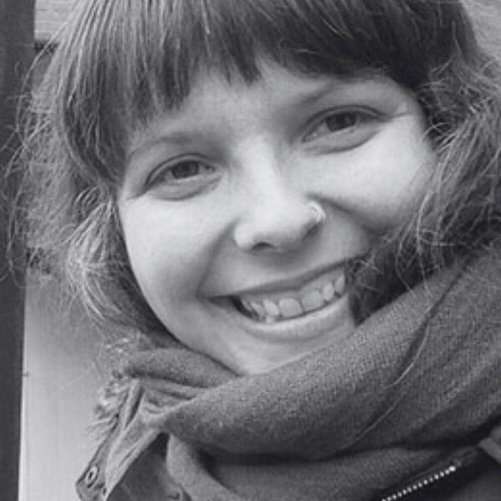 Black and white headshot of Cathy Paton.