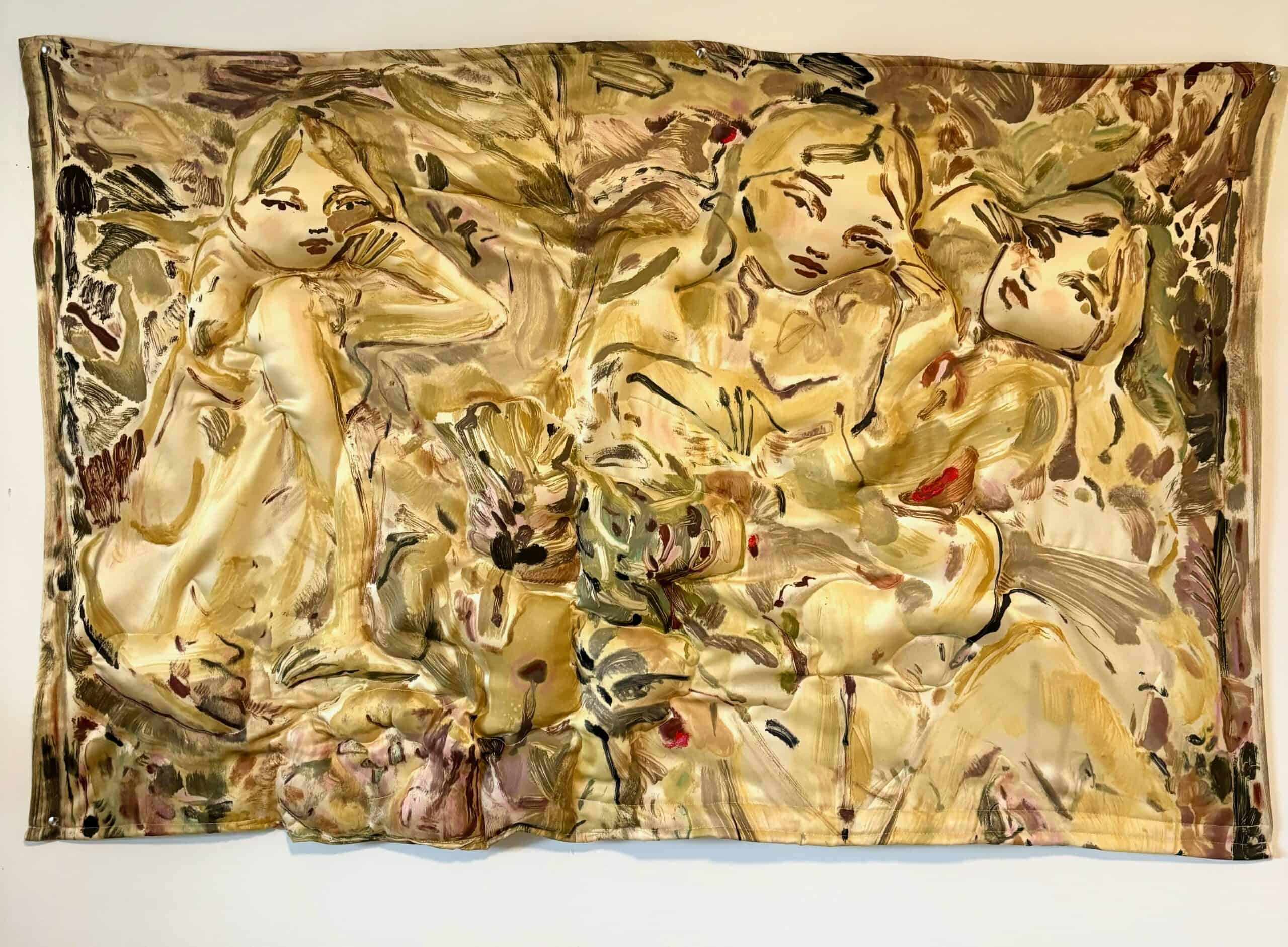 A large, painted textile artwork shows three abstract, seated female figures with contemplative expressions, surrounded by flowing, earthy and golden tones in an impressionistic, nature-inspired scene.